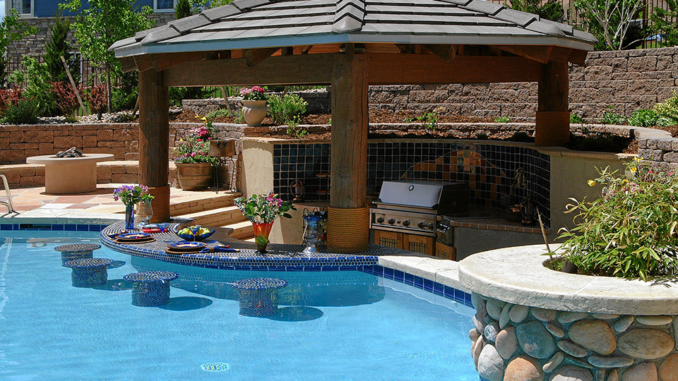 Gazebo, chairs, and counter inside the swimming pool