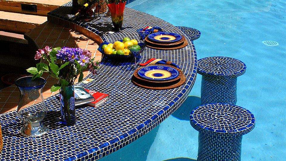 Gazebo, chairs, and counter inside the swimming pool