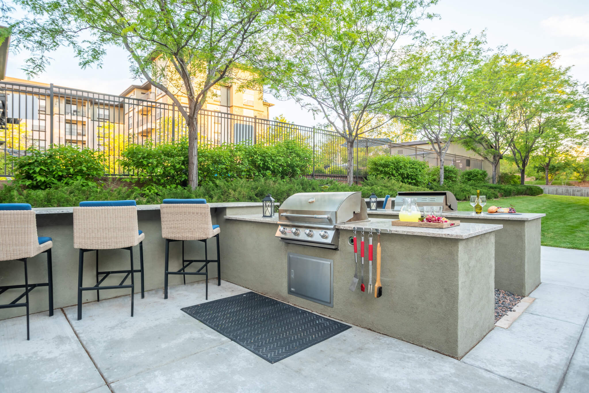 Outdoor cooking area with chairs