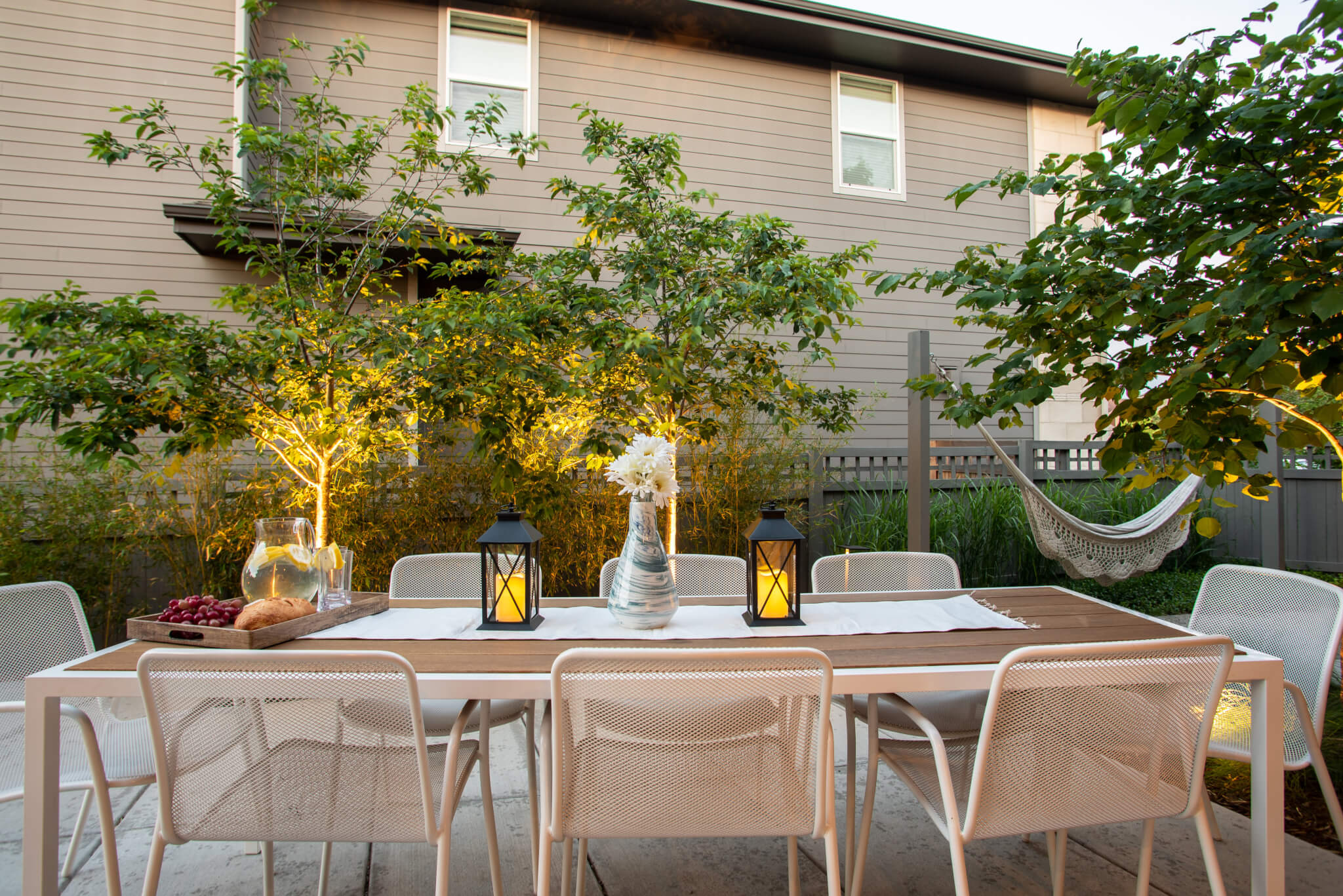 Chairs and dining table setup in the backyard