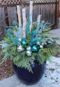 Potted plan decorated with holiday decor