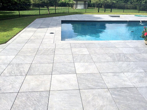 Porcelain Pavers Surrounding Pool