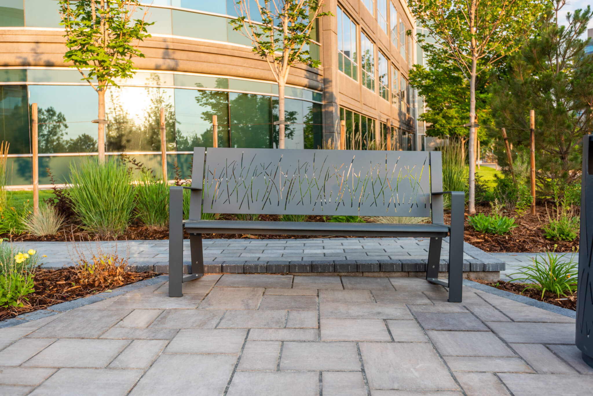 Sitting area with metal bench outside of the building