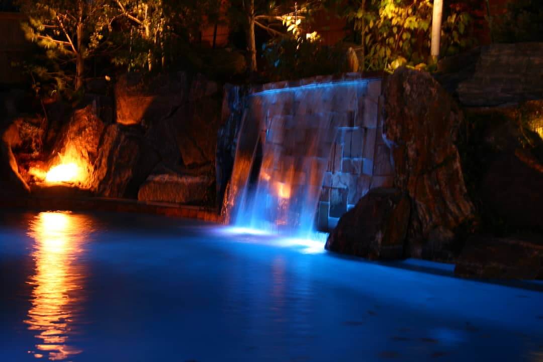 Pool & Waterfall Lit Up with Lighting Fixtures