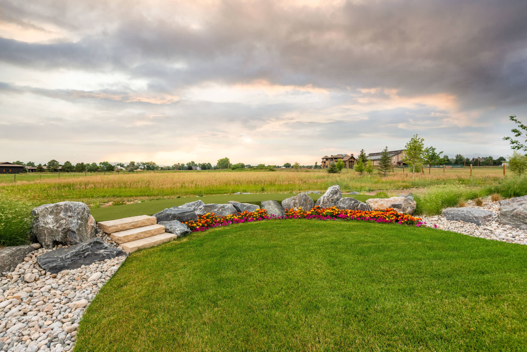 Rock garden with flower plants and landscape view