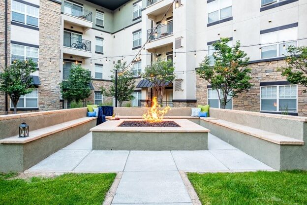 Outdoor Living Space Featuring Permanent Concrete Fire Pit