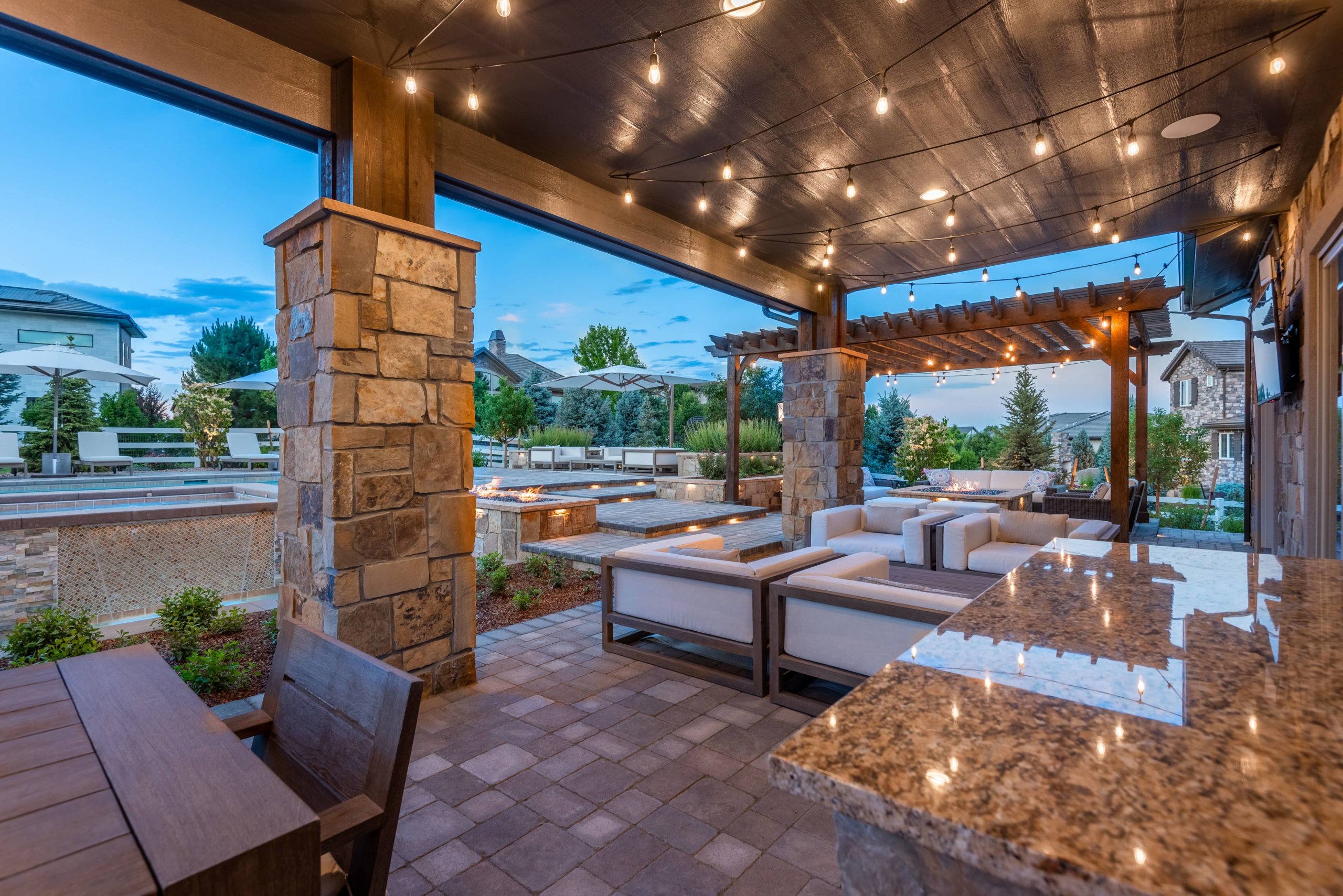 Outside sitting area with sofas and lightings